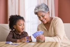 Grandmother and granddaughter playing cards 이미지 (86509346) - 게티이미지뱅크 Grandmother and granddaughter playing cards