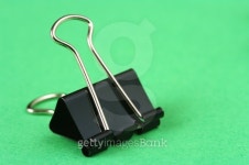 Bulldog clip on green 이미지 (147068158) - 게티이미지뱅크 Bulldog clip on green