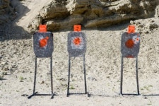 Three targets with bullet holes at firing range 이미지 (103581323) - 게티이미지뱅크 Three targets with bullet holes at firing... 