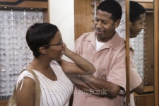 Couple trying on eyeglasses in store 이미지 (89077537) - 게티이미지뱅크 Couple trying on eyeglasses in store