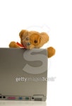 Teddy bear on laptop computer 이미지 (99425857) - 게티이미지뱅크 Teddy bear on laptop computer