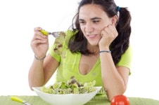Girl eating salad. I do not like anything! 이미지 (99819696) - 게티이미지뱅크 Girl eating salad. I do not like anything!