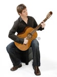 Learning to play guitar 이미지 (145154440) - 게티이미지뱅크 Learning to play guitar