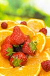 Photo of plate with orange, strawberry and raspberry, outdoors 이미지 (91718807) - 게티이미지뱅크 Photo of plate with orange... 