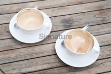 Pair of Empty Coffee Cups Wooden Table 이미지 (172785367) - 게티이미지뱅크 Pair of Empty Coffee Cups Wooden Table