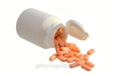 Medicine pills with a white bottle on a white back 이미지 (99472983) - 게티이미지뱅크 Medicine pills with a white bottle on a... 