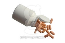 Medicine pills with a white bottle on a white back 이미지 (99533120) - 게티이미지뱅크 Medicine pills with a white bottle on a... 