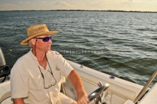 Man & Boat On The Water 이미지 (91632633) - 게티이미지뱅크 Man & Boat On The Water