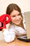 Attractive young woman at work place with boxing g 이미지 (94036942) - 게티이미지뱅크 Attractive young woman at work place... 
