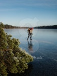 Skating on a lake 이미지 (101339528) - 게티이미지뱅크 Skating on a lake