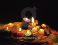 Candles melting onto sand 이미지 (96586082) - 게티이미지뱅크 Candles melting onto sand