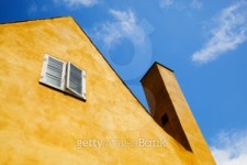 Yellow house and blue sky 이미지 (101385924) - 게티이미지뱅크 Yellow house and blue sky