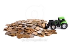 Green tractor raking up coins 이미지 (91508384) - 게티이미지뱅크 Green tractor raking up coins