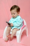 baby with pocket PC on chamber-pot 이미지 (95536889) - 게티이미지뱅크 baby with pocket PC on chamber-pot