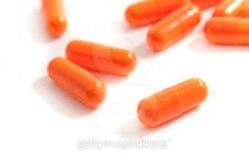 bunch of orange pills 이미지 (100302023) - 게티이미지뱅크 bunch of orange pills