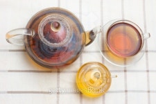 Glass Teapot, mug and honey jar on checkered tablecloth 이미지 (153706778) - 게티이미지뱅크 Glass Teapot, mug and honey jar... 