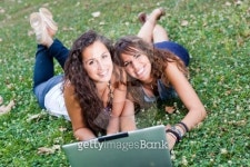 Two Young Woman With Laptop PC at Park 이미지 (119462890) - 게티이미지뱅크 Two Young Woman With Laptop PC at Park