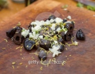 Black olives with garlic and lemon zest 이미지 (152050867) - 게티이미지뱅크 Black olives with garlic and lemon zest