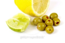 Lemon Stuffed Olives And Lime On Cutting Board 이미지 (121322260) - 게티이미지뱅크 Lemon Stuffed Olives And Lime On Cutting Board