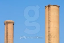 pair of industrial chimneys 이미지 (101762114) - 게티이미지뱅크 pair of industrial chimneys