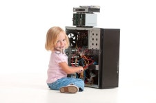 Young girl fixing her PC. 이미지 (183137792) - 게티이미지뱅크 Young girl fixing her PC.