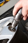 Mechanical repairs a tire. 이미지 (183282500) - 게티이미지뱅크 Mechanical repairs a tire.