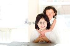 Asian-American child hugging her Grandma 이미지 (182787615) - 게티이미지뱅크 Asian-American child hugging her Grandma