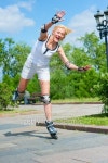 Girl roller-skating in the park 이미지 (134827632) - 게티이미지뱅크 Girl roller-skating in the park