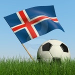 Soccer ball in the grass and the flag of Iceland against the blue... ball in the grass and the flag of Iceland against the blue sky. 3d