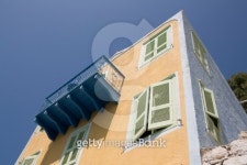 Kastellorizo Island - Yellow house and blue balcony 이미지 (120059920) - 게티이미지뱅크 Kastellorizo Island - Yellow house... 