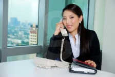 Smiling Business Girl Talking To Telephone 이미지 (147961623) - 게티이미지뱅크 Smiling Business Girl Talking To Telephone