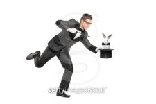Magician holding a top hat with rabbit in it 이미지 (177547139) - 게티이미지뱅크 Magician holding a top hat with rabbit in it