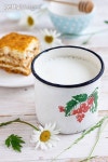 Mug of fresh milk and honey cake 이미지 (148393175) - 게티이미지뱅크 Mug of fresh milk and honey cake