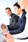 Three happy smiling businesspeople at meeting 이미지 (154199239) - 게티이미지뱅크 Three happy smiling businesspeople at meeting