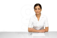 Woman wearing a white lab coat with pencil and paper 이미지 (177284033) - 게티이미지뱅크 Woman wearing a white lab coat with... 