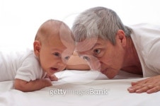 Grandmother playing with a baby 이미지 (177535936) - 게티이미지뱅크 Grandmother playing with a baby
