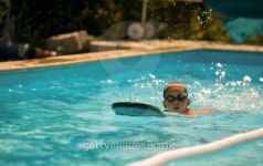 Boy practice swimming 이미지 (462394121) - 게티이미지뱅크 Boy practice swimming