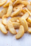 Potato Wedges with assorted Peppers and Seasoning 이미지 (178987507) - 게티이미지뱅크 Potato Wedges with assorted Peppers and... 
