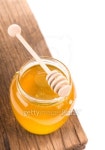 Honey in bank on wooden boards 이미지 (168814307) - 게티이미지뱅크 Honey in bank on wooden boards