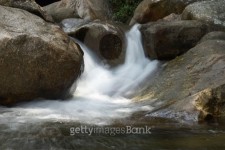 Small Waterfalls flowing over the rock. 이미지 (187490319) - 게티이미지뱅크 Small Waterfalls flowing over the rock.