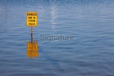 Danger end of storm drain sign 이미지 (174832326) - 게티이미지뱅크 Danger end of storm drain sign