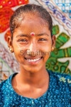 Young Indian girl selling colorful embroidered rugs 이미지 (180720503) - 게티이미지뱅크 Young Indian girl selling colorful... 