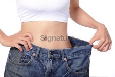 woman shows weight loss by wearing old jeans 이미지 (172455130) - 게티이미지뱅크 woman shows weight loss by wearing old jeans