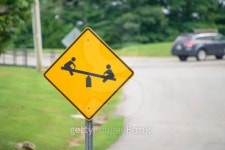 Yellow playground warning sign on the road 이미지 (184630895) - 게티이미지뱅크 Yellow playground warning sign on the road