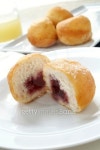 Jam filled donuts on white plate 이미지 (186261104) - 게티이미지뱅크 Jam filled donuts on white plate