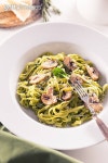 Tagliatelle pasta with pesto on white plate 이미지 (178516735) - 게티이미지뱅크 Tagliatelle pasta with pesto on white plate