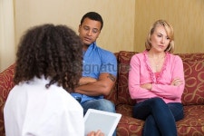Sad mixed-race couple at the marriage counselor 이미지... 게티이미지뱅크 Sad mixed-race couple at the marriage counselor