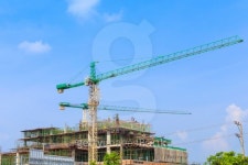 Crane working in construction on blue sky 이미지 (186634532) - 게티이미지뱅크 Crane working in construction on blue sky