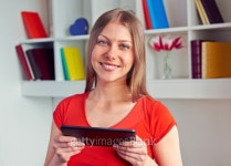 woman holding the tablet pc and looking at camera 이미지 (177809189) - 게티이미지뱅크 woman holding the tablet pc and looking... 