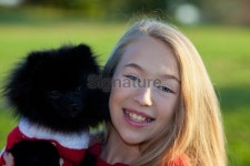 Girl and Black Pomeranian DOg 이미지 (460279259) - 게티이미지뱅크 Girl and Black Pomeranian DOg